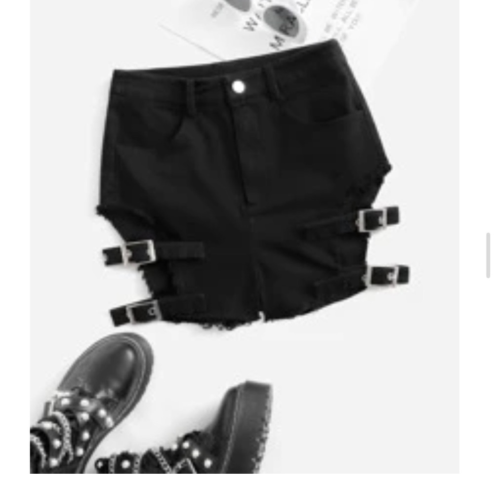 Black shorts with buckles